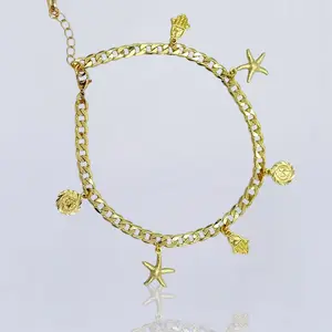 Unisex  anklet with a pendants perfect for summer gold plated 14k