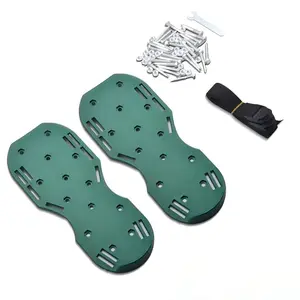Lawn perforator shoes with sharp, short spikes for loosening garden lawns and suitable for epoxy flooring.