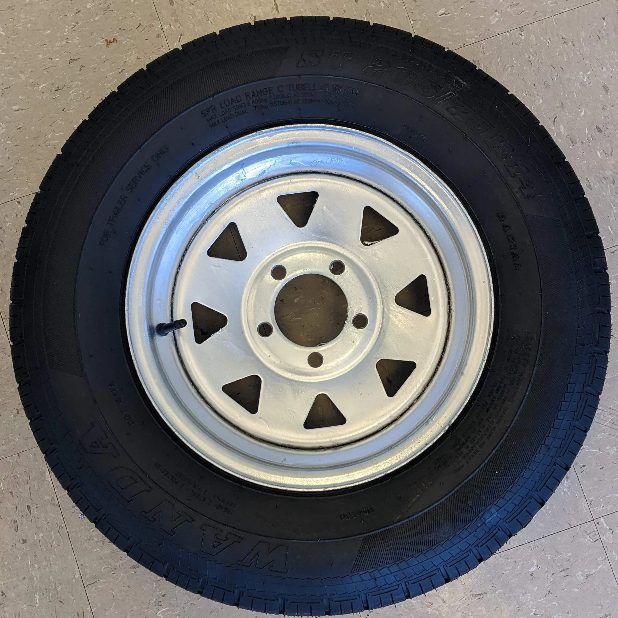 ST205/75R14 LRC 5 on 4.5" Silver Modular Tire On Rim