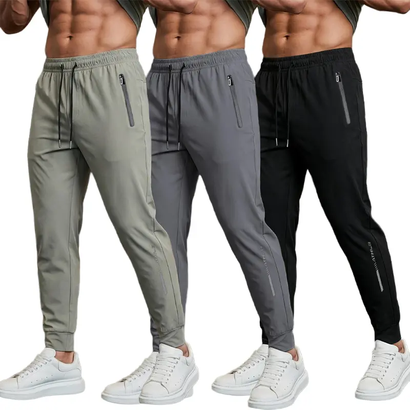 Men’s stretch joggers — cuffed athleisure pants for active wear | lightweight, breathable gym outfits; spring/summer fashion; solid-color sports pants; men’s clothing; cuffed sweatpants; polyester sweatpants