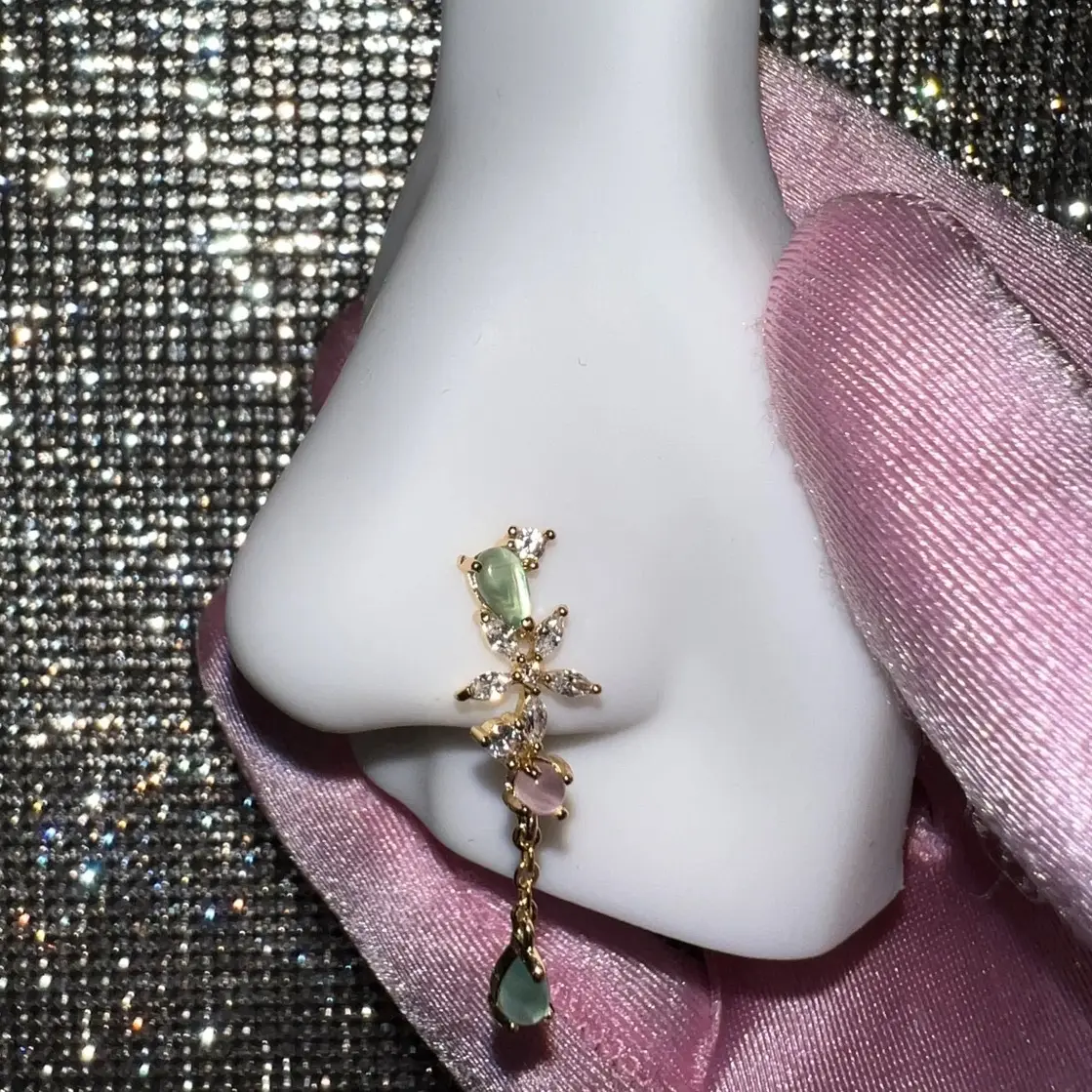 Dangle Nose Ring with Gold-Tone Finish and Decorative Elements Dangle Nose Ring with Gold-Tone Finish and Decorative Elements