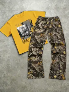 The men's two-piece set includes a short-sleeved T-shirt with a print of letters and street scenes and a pair of long pants; made of knitted fabric; suitable for everyday wear and all seasons. Casual Menswear Tee Clothes
