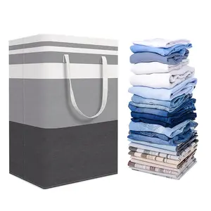 Collapsible laundry basket, used for storing dirty clothes, featuring a striped fabric design. It is very suitable for storing laundry and toys in dormitories and homes, with a spacious capacity and extended handles.