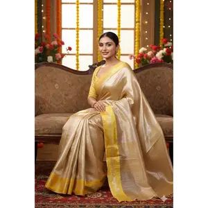 Aahana – The Golden Glow | Tissue Brocade Saree with Satin Border