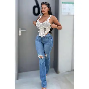 Jessie Mid Rise Distressed Bootcut Jean - Light Blue Wash