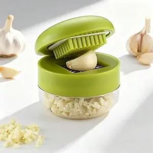 Manual Heavy Duty Garlic Press Crusher Single Pack with Easy Clean Chopping Board Compact Handheld Design for Easy Storage Durable And Sturdy Plastic Material Easily Crushes And Chops Garlic Dishwasher Safe Kitchen Goodies