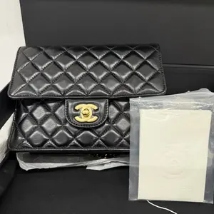 Pre-owned CHANEL 23k Chain Evening Clutch, Black and Gold Lambskin, Like New Condition (99%), Seals Still Intact, Full Set with Chip, B2501022