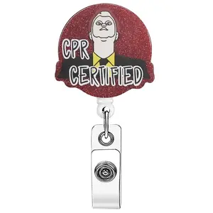 A retractable name tag buckle with text of CPR certification and cartoon character images. The background has a red glitter design. It is equipped with a retractable structure and a metal clip, and can be used to hang name tags, Badge Holder