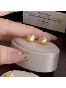 1 pair of Hello Kitty rings and earrings - small, sweet, cartoonish charm. Perfect for a girl's delicate, everyday cute style!