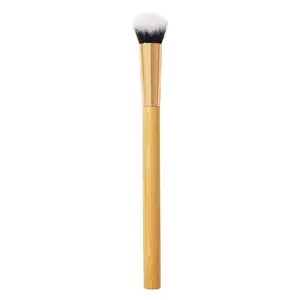concealer paw brush - angled for seamless application