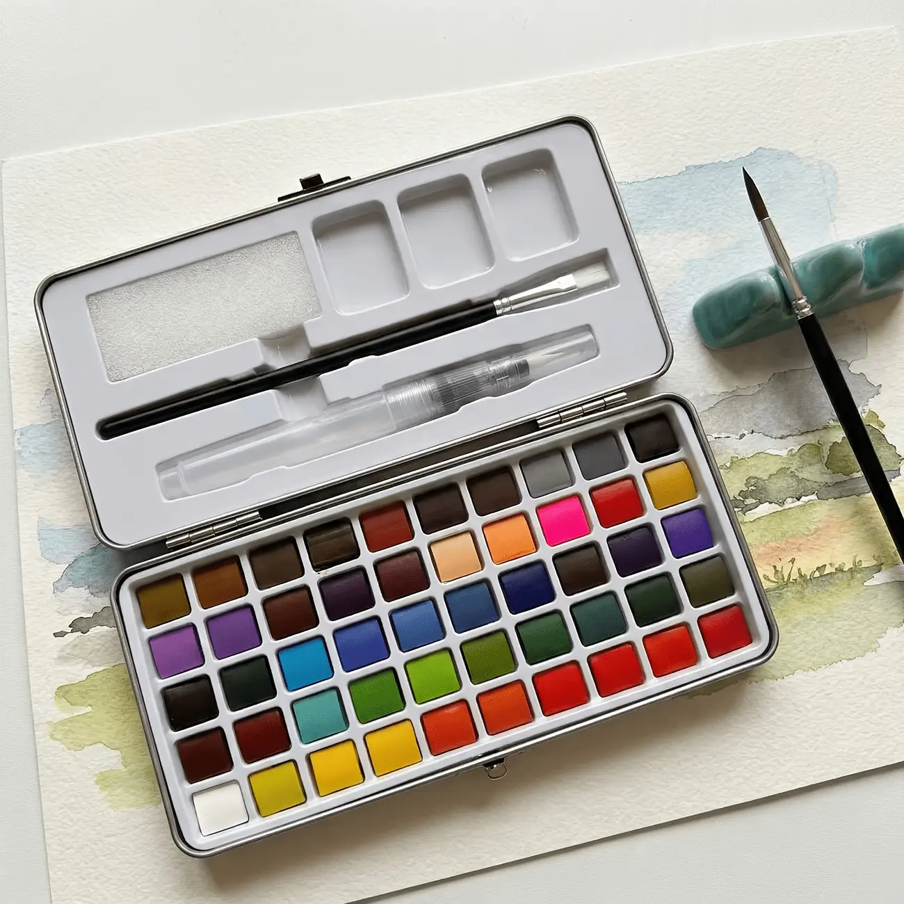 50-Shades Rich Highly Concentrated Color Solid Watercolor Paint Set - Metal Tin Compact Travel-Ready Artist Supplies Kit with Water Brush, Sponge, Paintbrush, Ideal for Beginners, Art Enthusiasts, Landscape Painting, Hand Lettering