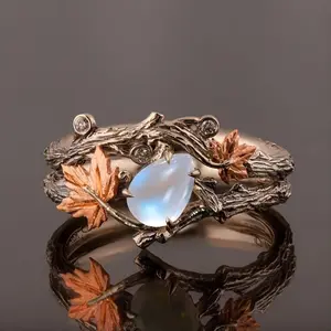 Elegant Maple Leaf Double Ring Set: Adorned with Blue stones, Rose Golden Plated, a Vintage Choice Zinc Alloy Crafted