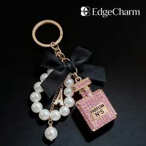 Korean Style Rhinestone Perfume Bottle Keychain with Bow, Luxury Pearl Chain Bag Charm, Elegant Parfum Key Ring Accessory for Women