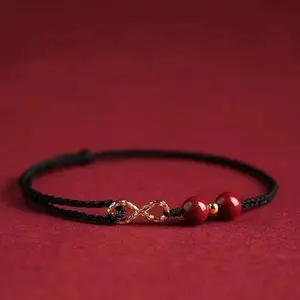 Infinity red thread bracelet with cinnabar beads for luck and peace (Vong tay chi do vo cuc hat chu sa may man binh an)