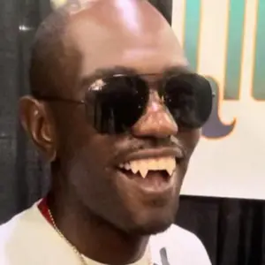 Transform your smile with bold, realistic vampire fangs — no glue needed! C