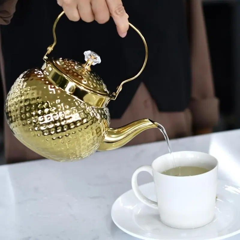 A Middle Eastern hammered design stainless steel teapot - heavy-duty 201 stainless steel with a filter, suitable for use on induction cooktops/gas stoves, and oven-safe (for both home and restaurant use) Teapot With Strainer