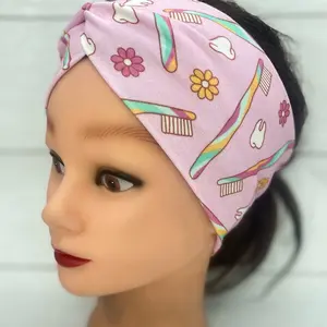 Pink Dental Twist Headband with Buttons, Featuring Dental Imagery and Soft Fabric