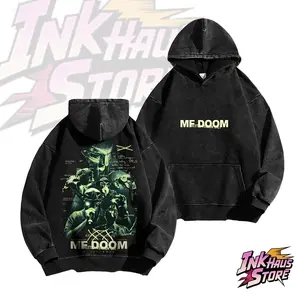 Washed sweatshirt featuring images and text of British rapper *MF DOOM*'s mask and multiple portraits in varying shades-Long Sleeve Cotton Unisex Vintage Hoodie