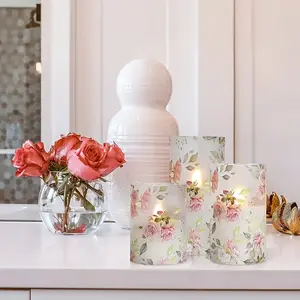 Set of 3 flameless LED pillar candles that flicker, with a 10-key remote control. Pink floral design for spring and summer; suitable for wedding venues and dining tables, Mother’s Day celebrations, and as an ideal birthday gift.