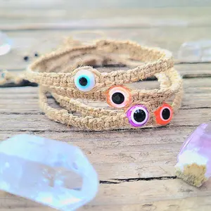tan adjustable macrame evil eye braclet