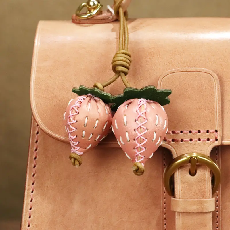 Handmade Real Cowhide Strawberry Keychain - Dual Strawberry design with Natural Rope Loop, Vintage Farmhouse Charm - Bag, Purse, Car Key Pendant - Birthday/Valentine's Gift for Women - Durable Cowhide Material, Purse Decoration, Playful Acc