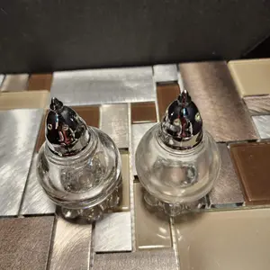 Elegant Crystal Salt & Pepper Shakers with Etched flowers & Silver Metal tops