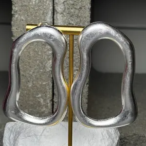 In Motion Oval Hoop Earrings