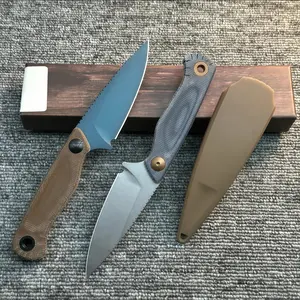 The 203 EDC fixed-blade knife features a compact design and a textured, non-slip handle, combining a stylish aesthetic with practical outdoor functionality.