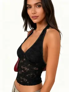 A women's black lace camisole, backless V-neck cropped bodycon top, sexy and fashionable hot girl style, suitable for summer, daily outings, vacations, and other occasions.