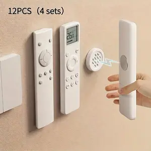 12 pieces (4 sets) magnetic remote control holders - Suitable for TV and air conditioner remotes - No drilling required, easy to install and space-saving - No-drill adhesive magnetic wall hooks