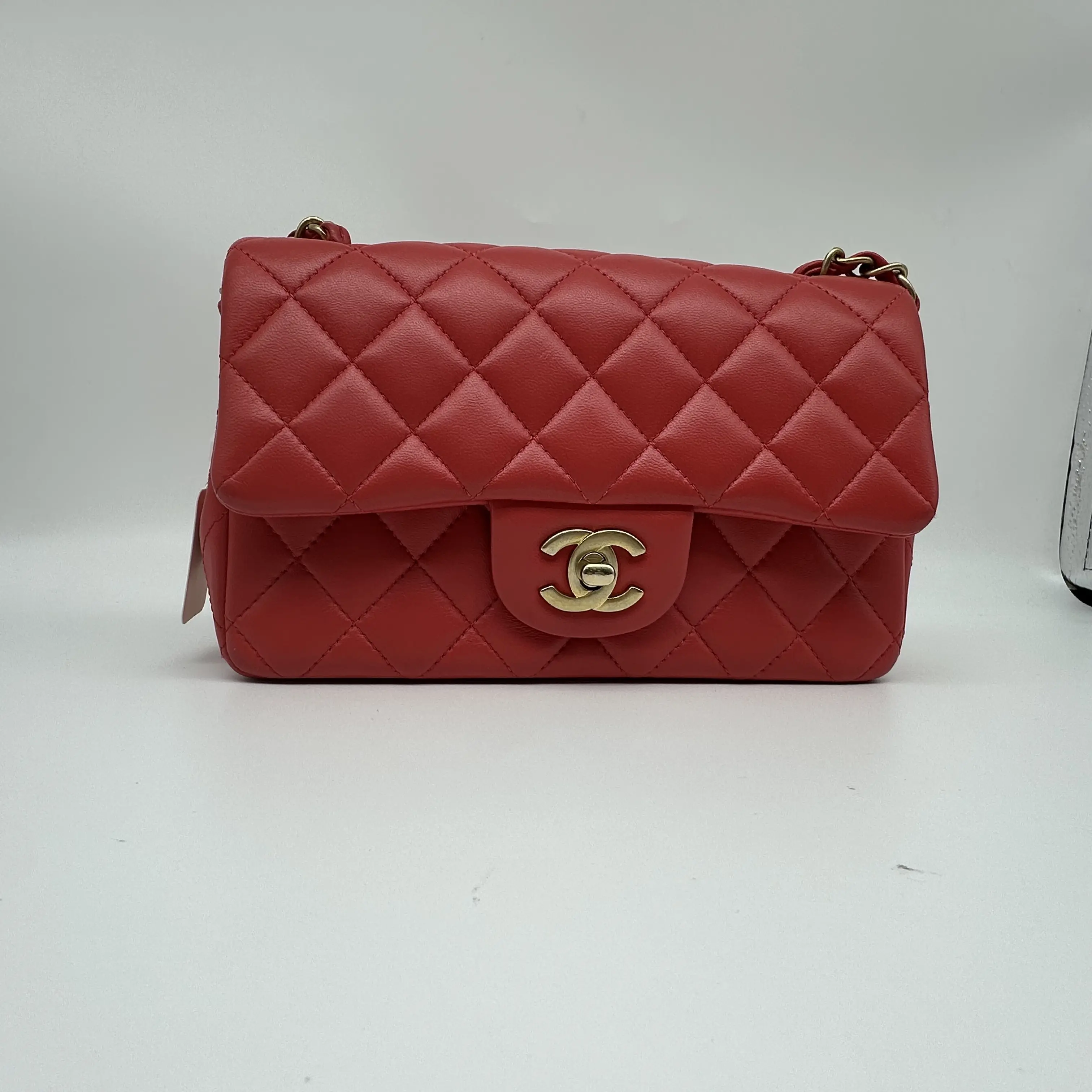 Pre-owned CHANEL red quilted caviar leather mini flap bag