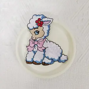 1PCS cartoon lamb floral embroidery cloth patch, Patch Embroidered, with a pink bow design badge, suitable for DIY decorative patches on hats, bags, shoes, and clothing. Durable material with back hot melt adhesive that can be sewn, ironed, and washed