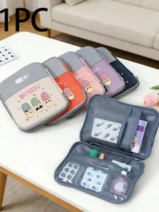 A portable medical kit printed with the word 'Medicine' and pill patterns, a portable camping medicine bag, compact first aid kit, travel and home portable storage bag version, small medicine bag