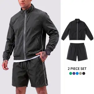 Trendy men’s minimalist casual wear featuring a stand-collar zip jacket and athletic shorts set, made from comfortable slightly stretchy fabric for a premium look. Suitable for city walks and holiday travel—casual sportswear recommended.