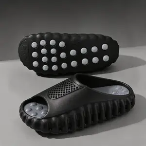Unisex thick-soled cloud slides with drainage holes, non-slip quick-dry shower slippers, open-toe sandals for men and women—suitable for indoor/outdoor use in bathrooms, on the beach, at pools, and at gyms.