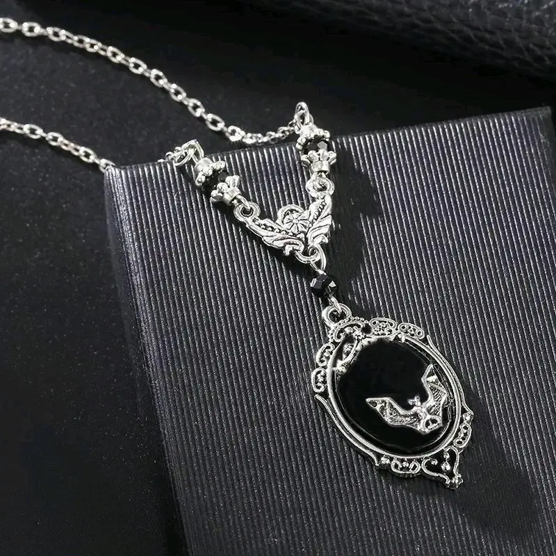 Gothic style Cameo bat necklace with black beads and filigree accents