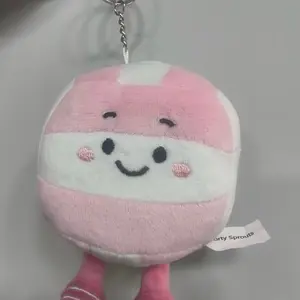 "Bumpette" Pink and White Plush Volleyball Keychain with Smiley Face Design by Sporty Sprouts. Great for volleyball gift, volleyball themed birthday or bag charm.