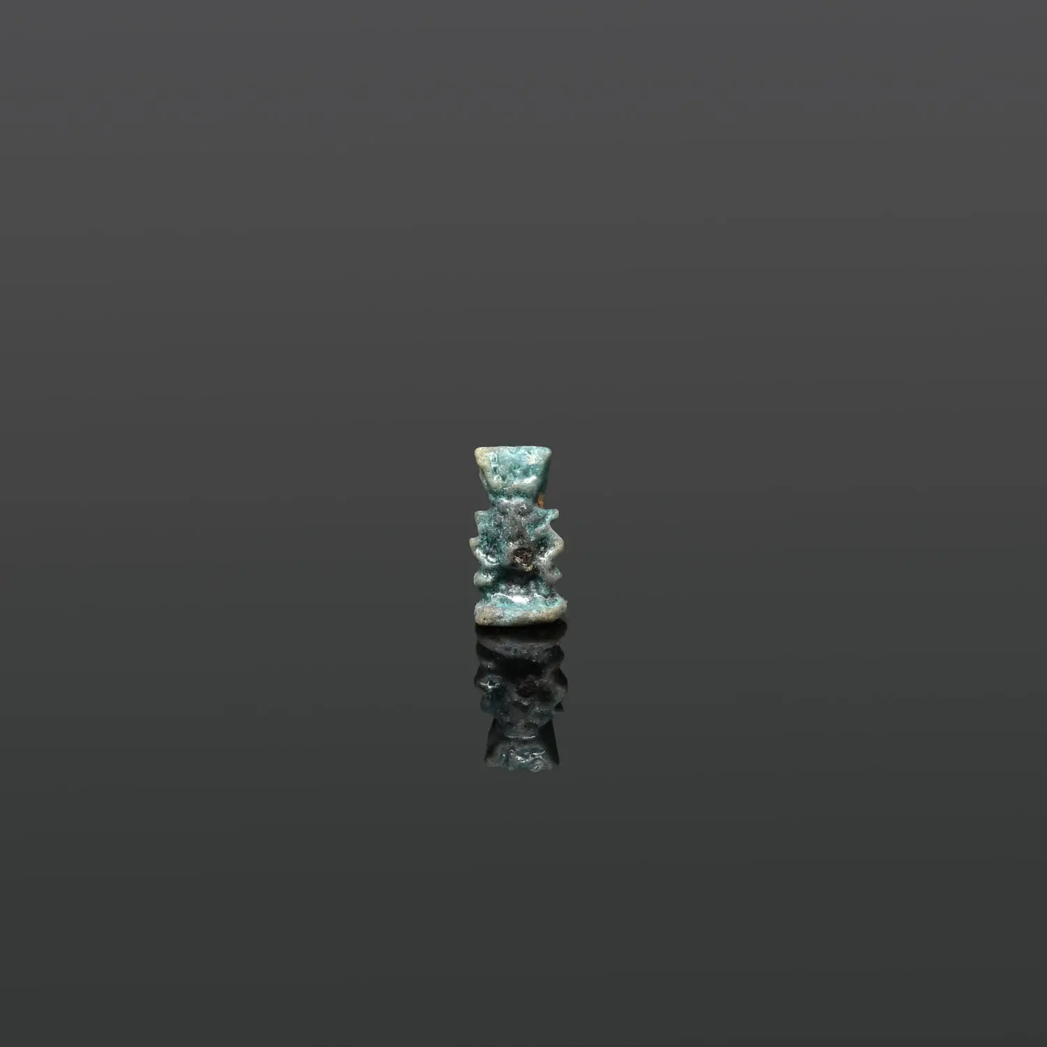 An Egyptian Faience Amulet of Bes, Late Period, ca. 664 - 332 BCE