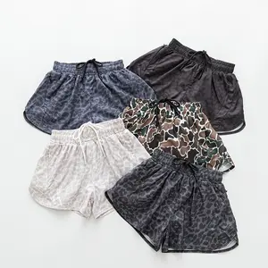 Women’s quick-dry elastic fitness shorts — leopard print camouflage, faux two-layer design, anti-exposure