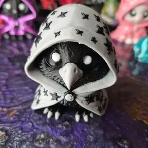 Mystical Raven Figurine with Star Pattern Hood and Detailed Features for Collectors