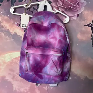 (232)Tie Dye Backpack - Purple and Pink Gradient Design with Front Pocket and Zipper Closure