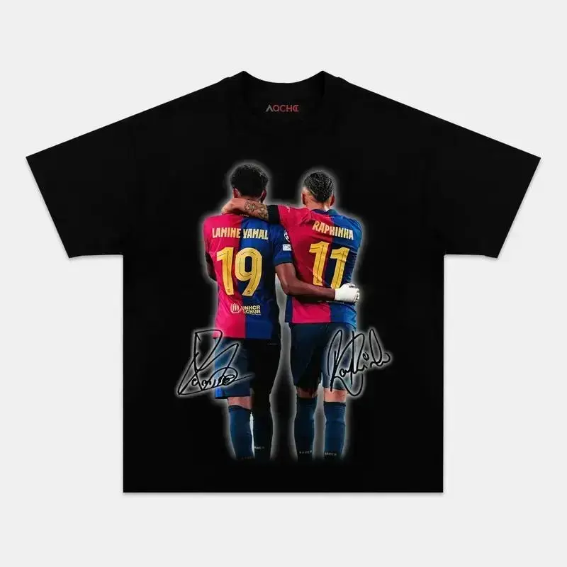 LAMINE YAMAL 19 and RAPHINHA 11 embrace each other in a back T-shirt, winning the championship. The red and blue jersey portraits and gold numbers contrast strongly on a black background, highlighting the visual hierarchy.