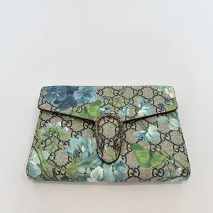 Pre-owned GUCCI GG Supreme Canvas with Floral Print Crossbody Bags Dionysus GG Blooms Wallet on Chain GG Supreme Canvas Blue Floral