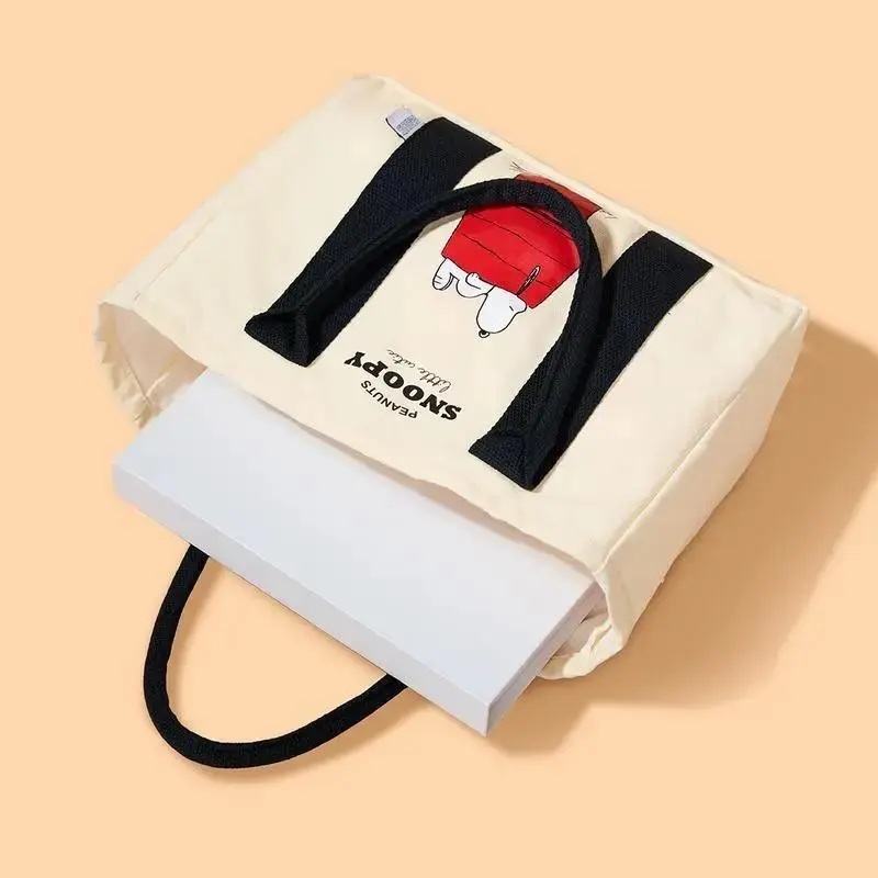 Miniso Peanuts Snoopy Canvas Tote Bag for Women, Chic Cottagecore Look with Cartoon Graphic, Lightweight with Reinforced Stitch and Double Handle for Everyday Carry, Machine Washable, Casual Use