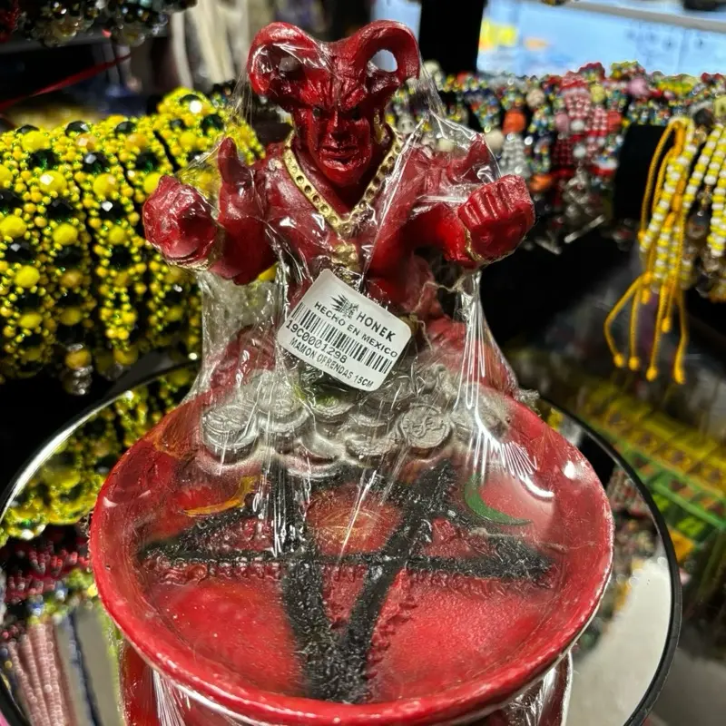 Red mammon statue