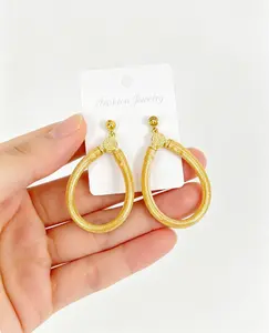 Oval Hollow Earrings with Metal Coating, Luxurious Sophisticated Feel, Etoile All-Weather Costume Jewelry