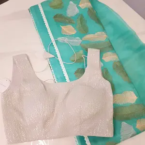 Tealblue Soft Organza Saree with leaf embroidery allover. Paired with soft sequin blouse.