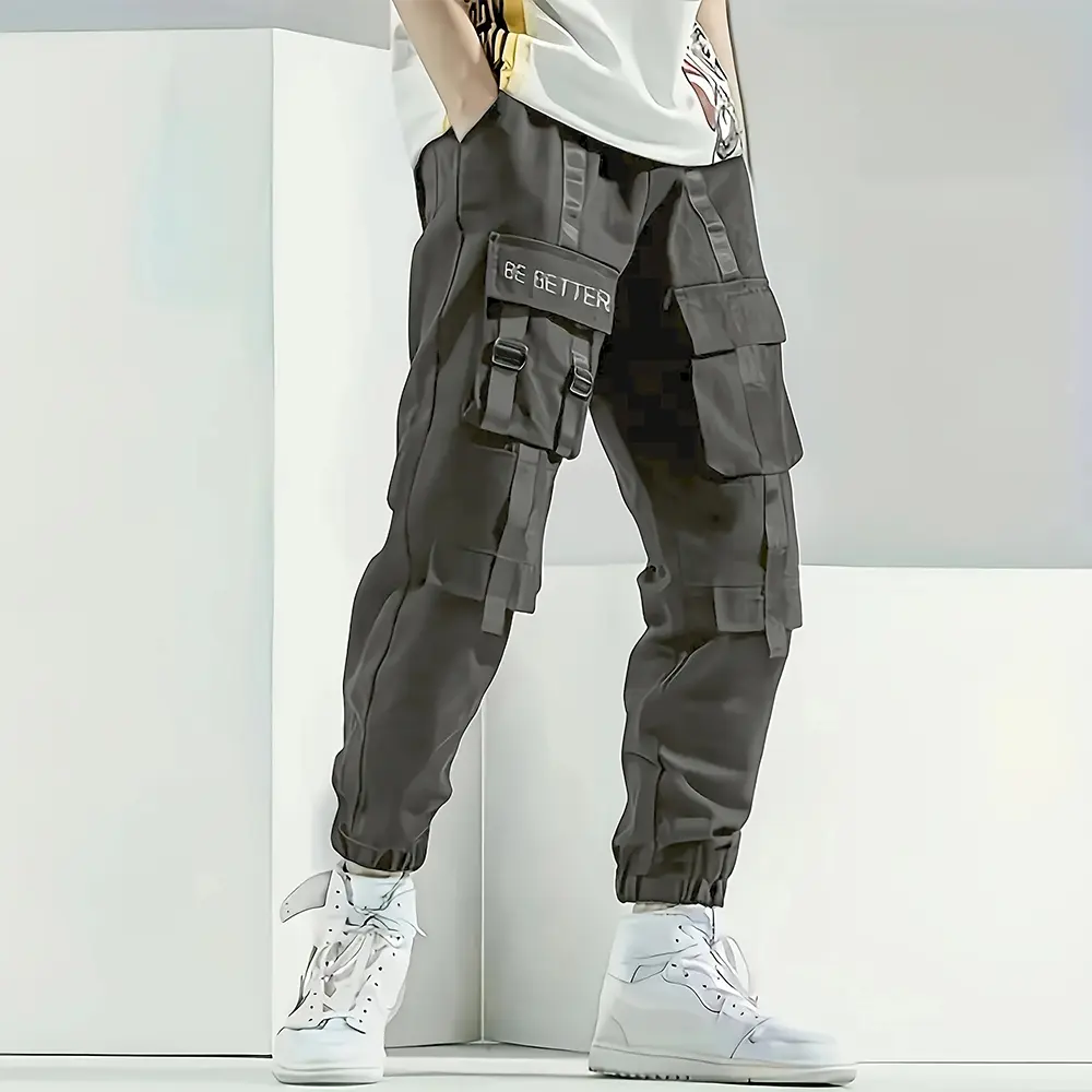 Men’s American high-street functional cargo pants with drawstring cuffs; trendy tactical long pants with ribbon detailing; versatile men’s athletic casual long pants from a streetwear brand.