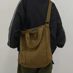 Retro Japanese style canvas shoulder bag, men's adjustable shoulder strap, casual commuting handbag, solid color, black, compact, suitable for gym use, shoulder bagRAIMENTRY