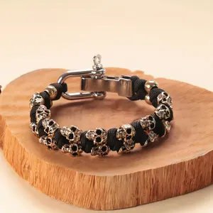 Hand-woven bracelet men with retro design, featuring skull-shaped alloy beads and paracord, without any elements, equipped with a reliable shackle clasp